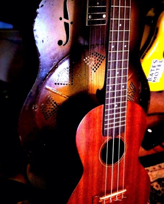 Close up of ukueles at a show